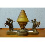 An Art Deco spelter table lamp