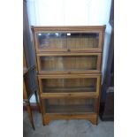 An early 20th Century oak four tier bookcase