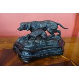 A small French style bronze figure of hunting dogs, on black marble socle