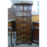 A French style mahogany semainier chest of drawers