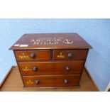 A mahogany counter top shop cabinet, bearing Clark & Co. Anchor Mills inscription, 32cms h x 41cms w