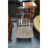 A pair of vintage teak stickback chairs