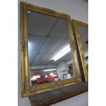 A gilt framed mirror