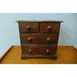 A Victorian apprentices stained pine chest of drawers, 29cms h x 29cms w