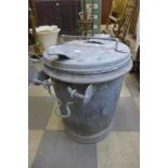 A galvanised bin with hinged lid