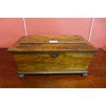 A George IV rosewood sarcophagus shaped tea caddy