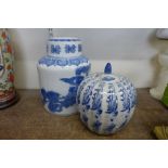 Two large oriental blue and white ginger jars and covers, one a/f