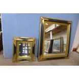 Two ebonised and parcel gilt framed mirrors