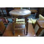 A Victorian elm stool