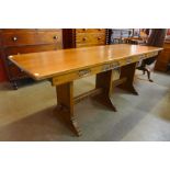 A carved oak refectory table