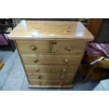 A pine chest of drawers