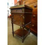 A 19th Century French mahogany, rosewood and gilt metal mounted table de nuit