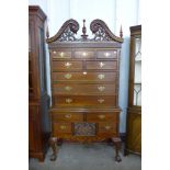 A Chippendale style hardwood chest on stand