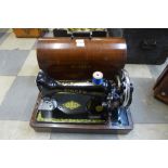 A Singer sewing machine with case