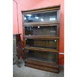 A Globe Wernicke oak four tier sectional stacking bookcase