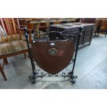 An Arts and Crafts copper and wrought iron fire screen