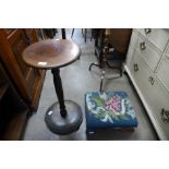 A Victorian mahogany and embroidered footstool and a beech jardiniere stand