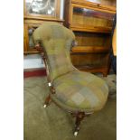 A Victorian mahogany and upholstered lady's chair