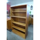 A teak open bookcase