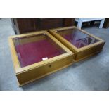 A pair of oak counter top display cabinets