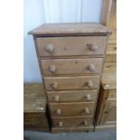 A pine chest of six drawers