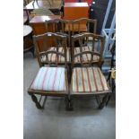 A set of four oak dining chairs