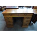 A Victorian mahogany kneehole desk