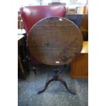 A George III circular oak tilt top tripod table