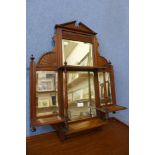 A small Victorian walnut overmantel mirror