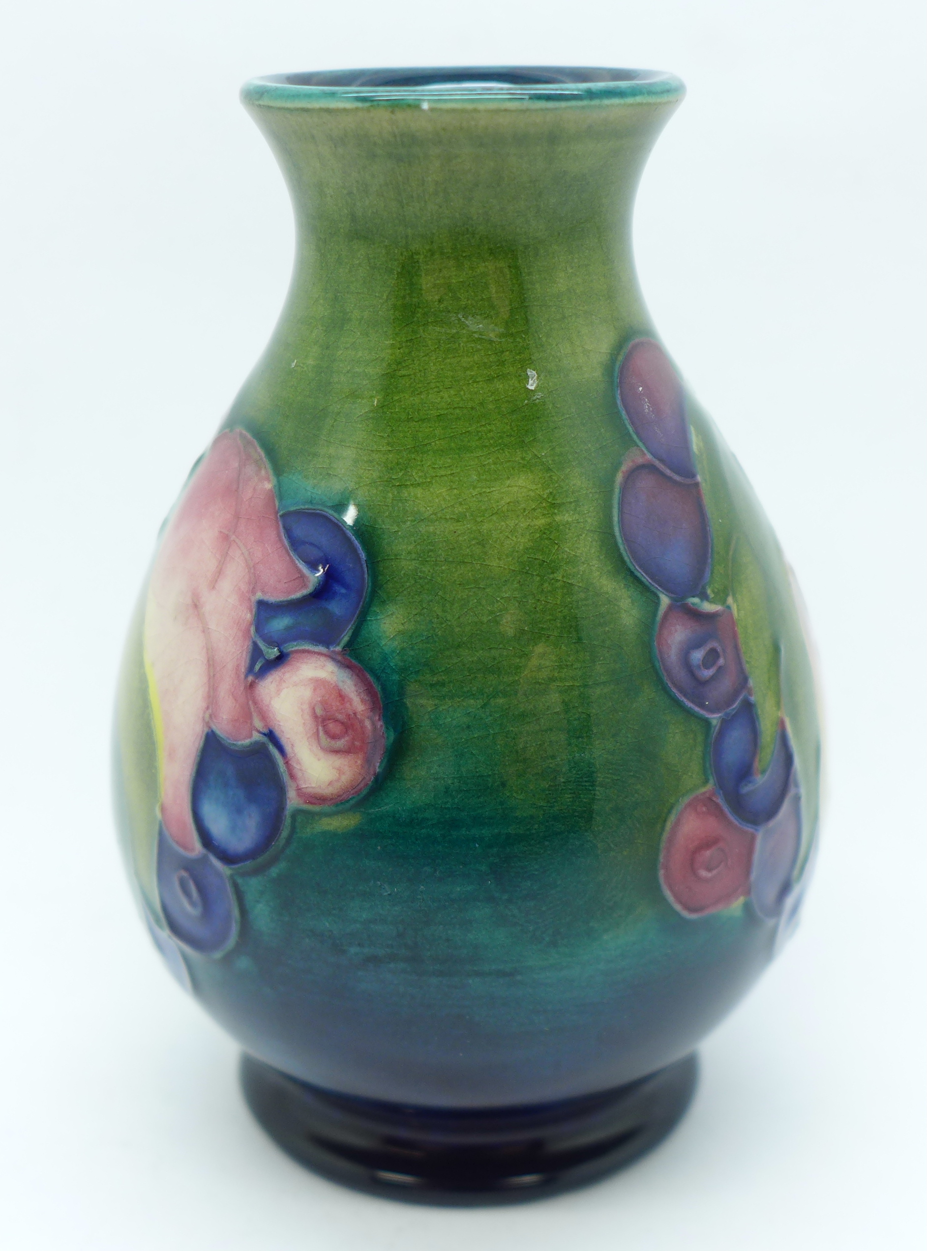 A Moorcroft Leaves and Fruit vase, with impressed signature and Potter to H.M. The Queen marks, 9cm - Image 4 of 5