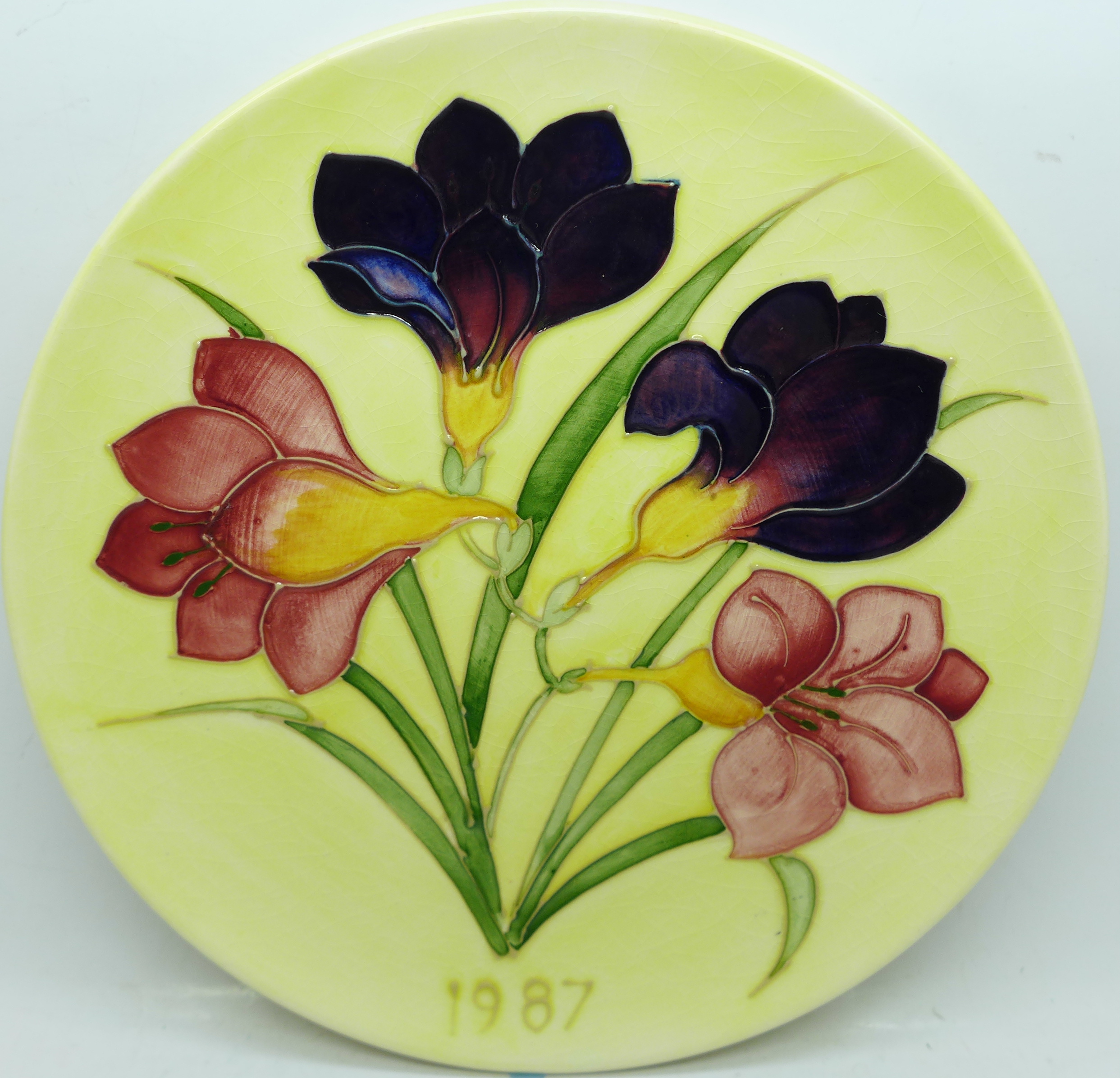 A Moorcroft Year Plate 1987, number 46, boxed, 22cm
