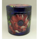 A Moorcroft anemone cylindrical lidded pot, height 9cm