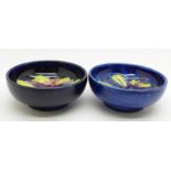 Two small Moorcroft bowls, 8cm diameter, one with crescent shaped crack on the rim, (157,164)