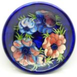 A Moorcroft anemone plate, crazed, 214mm
