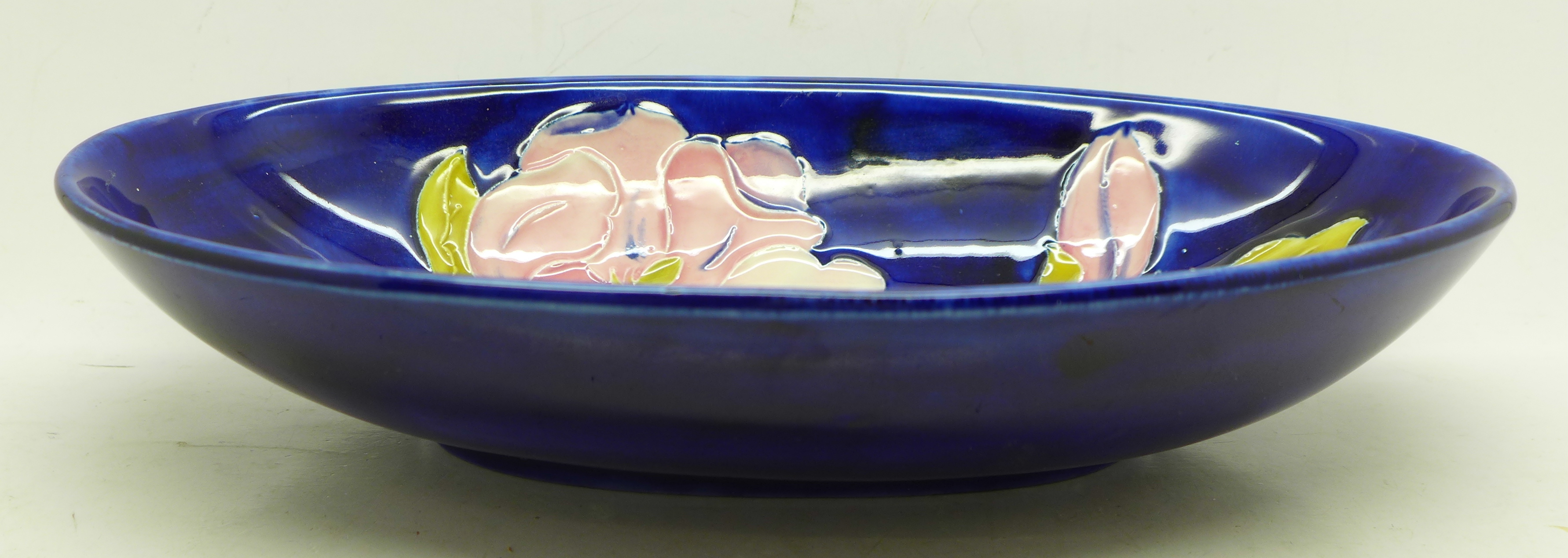 A Moorcroft magnolia oval dish, 23cm