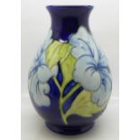 A Moorcroft hibiscus vase, 18.5cm