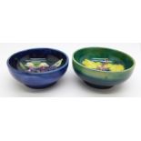 Two small Moorcroft bowls, orchid and hibiscus, 76mm and 79mm diameter, (158,171)