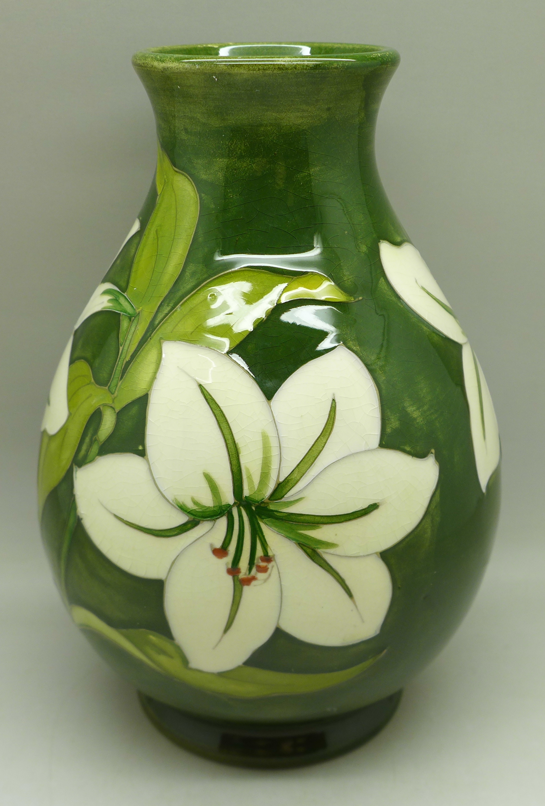 A Moorcroft Bermuda Lily vase, signed, 18.5cm