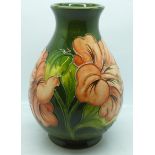 A Moorcroft hibiscus vase, 18.5cm