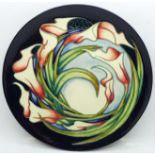 A Moorcroft Limited Edition 2005 Year Plate, 78/400, signed Sian Leeper, with wooden frame and