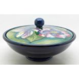 A Moorcroft lidded bowl, with impressed marks, 15cm diameter