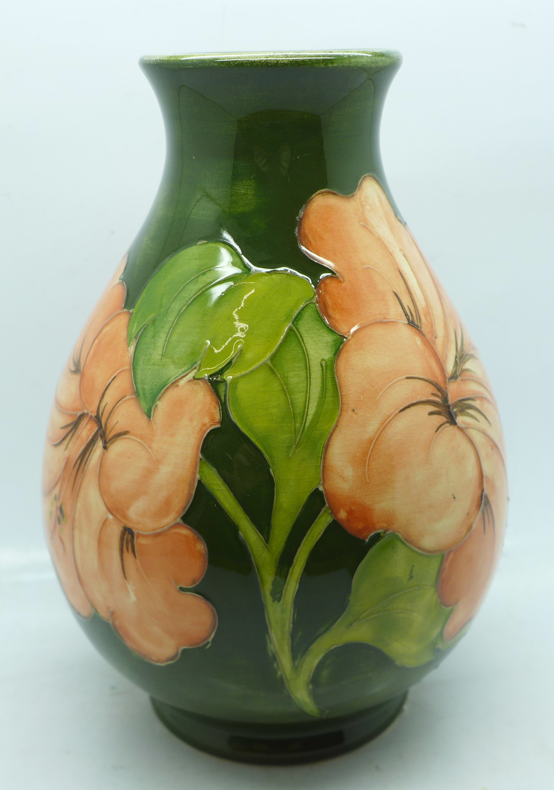 A Moorcroft hibiscus vase, 18cm