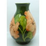 A Moorcroft hibiscus vase, 18cm