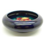 A Moorcroft freesia dish, 11cm diameter