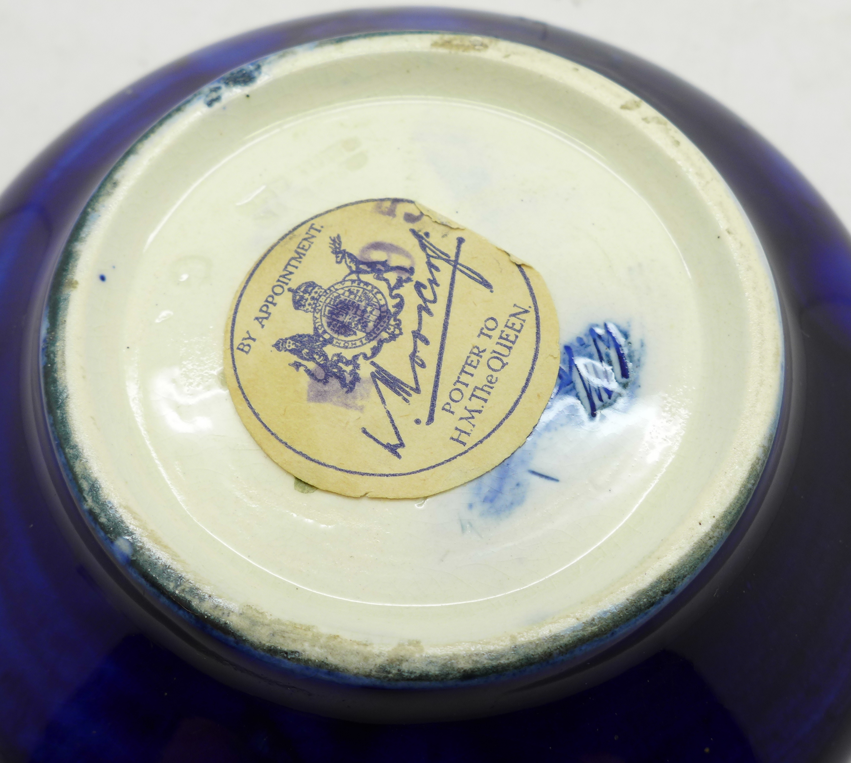 A Moorcroft bowl, with paper label, By Appointment to H.M. The Queen, 11cm diameter - Image 4 of 4