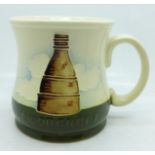 A Moorcroft mug, 1986