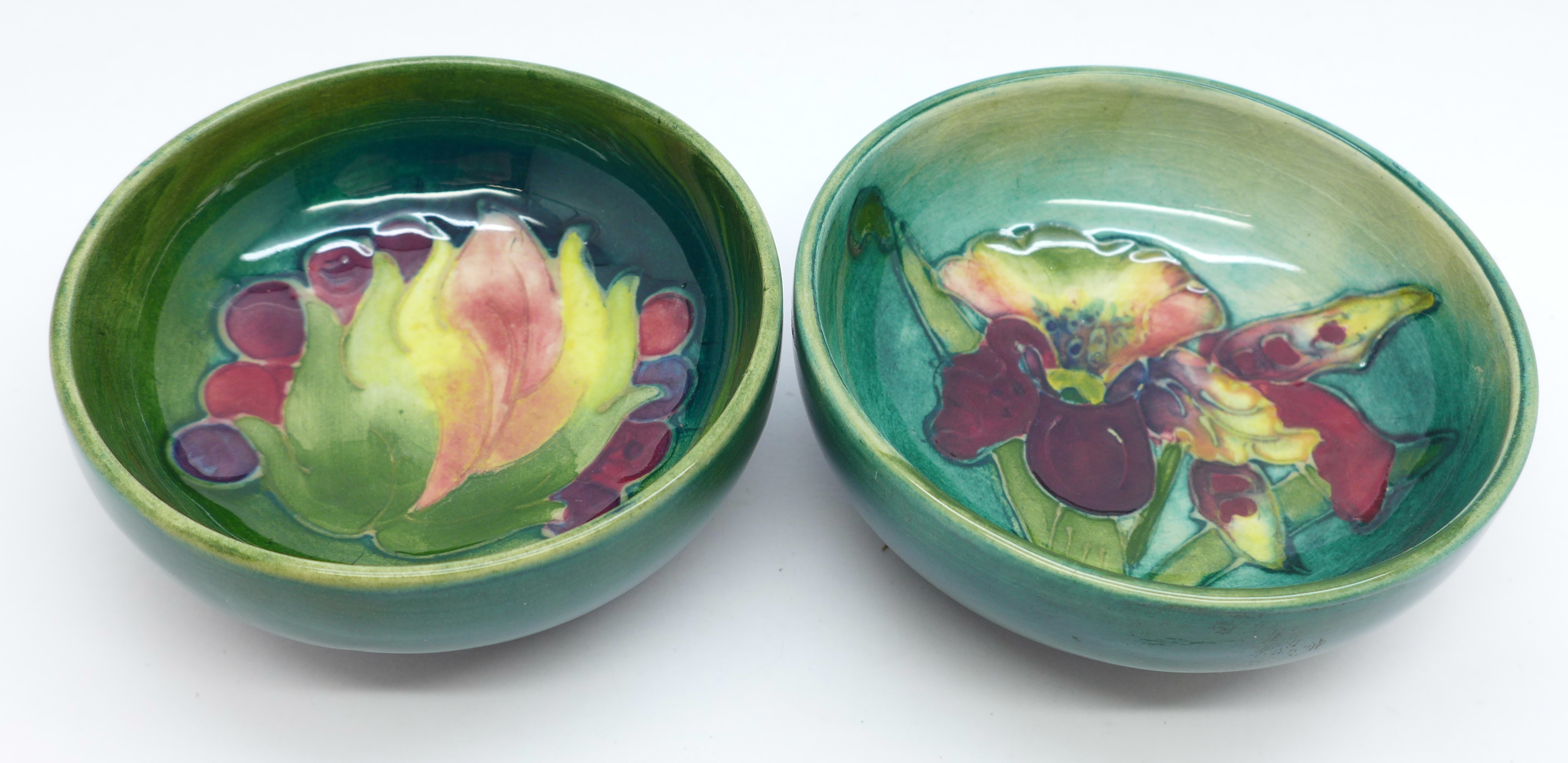 Two small Moorcroft bowls, Leaves and Fruit and orchid, 8cm diameter, (159,162)