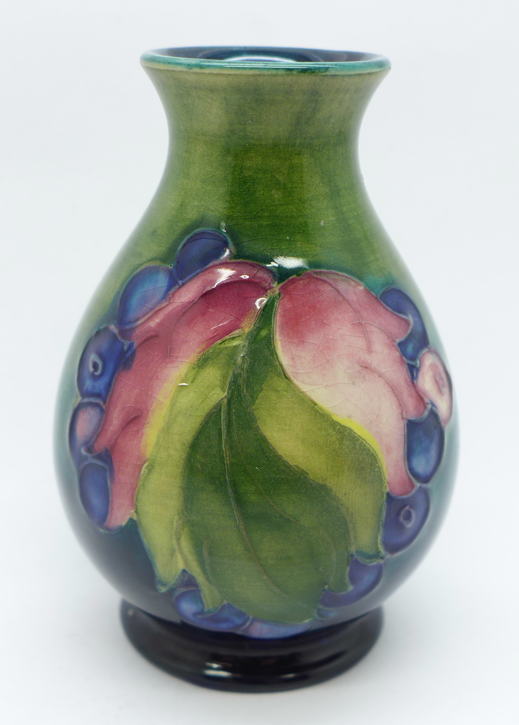 A Moorcroft Leaves and Fruit vase, with impressed signature and Potter to H.M. The Queen marks, 9cm - Image 3 of 5