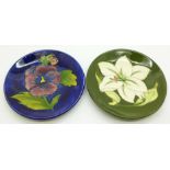 Two Moorcroft dishes, pansy and Bermuda lily, 116mm diameter, (172, 173)