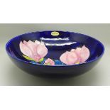 A large Moorcroft magnolia bowl, 26.5cm diameter